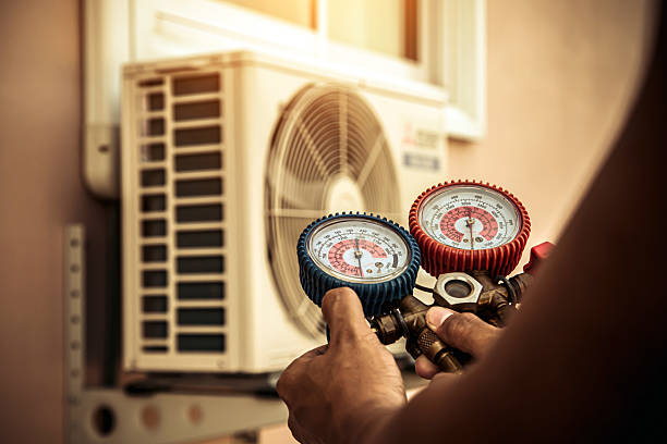 Professional Hvac Maintenance technician working in Mayflower, AR
